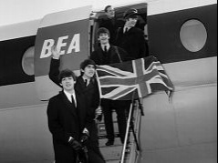 beatlesonplanestepswithbritishflags_240