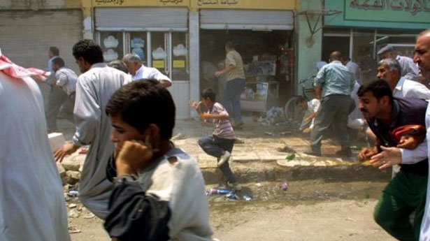 iraqisfleeingbombviaafp_615